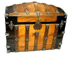 an old wooden chest with metal handles