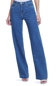 Add a fresh silhouette to your jeans collection in this wide-leg option done in a bright blue hue and kissed with just a hint of stretch. 34" inseam; 21" leg opening; 11" front rise; 15" back rise (size 29) 94% cotton, 5% polyester, 1% spandex Machine wash, line dry Made in the USA Bright Blue, Blue Hues, Who What Wear, Wide Leg Jeans, Wide Leg, Nordstrom, Blue, How To Wear