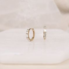 14k Gold Diamond Huggies / Solid Gold Mini Hoops / 14k Gold Mini Diamond Huggies / Small Diamond Gold Huggie Earrings / Sold As A Pair ✔ Diameters: Outer 10.5mm, Inner 7.5mm ✔ Hoop Thickness is 1.75mm ✔ Solid 14k Gold ✔ Natural Diamonds ✔ Total Diamonds Ct Weight: 0.25ctw Worldwide DHL shipping is now available 1-3 business days If you choose standard USPS shipping, it will take approximately 10-21 business days Made of solid 14k Gold (18k upon request) 🛠 All Sarah Elise pieces are handcrafted Classic Hoop Earrings With Baguette Diamonds For Wedding, Fine Jewelry Huggie Earrings With Baguette Diamonds For Wedding, Fine Jewelry Wedding Huggie Earrings With Baguette Diamonds, Classic Wedding Hoop Earrings With Baguette Diamonds, Classic Baguette Diamond Huggie Earrings For Anniversary, Baguette Diamond Huggie Earrings As Gift, Huggie Earrings With Baguette Diamonds For Gift, Wedding Baguette Diamond Hoop Earrings, Classic Huggie Earrings With Baguette Cut Prong Setting