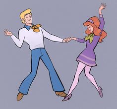 an image of a man and woman holding hands with each other while they are dancing