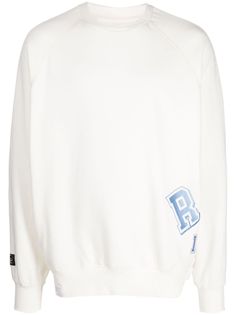 ivory white cotton blend logo print to the side and rear crew neck long sleeves straight hem ribbed cuffs and hem Cream Sweatshirt With Logo Print For Fall, White Ribbed Collar Sweatshirt For College, Oversized Crew Neck Sweatshirt With Logo, Cream Logo Print Sweatshirt For Fall, White Crew Sweatshirt With Logo, Oversized Crew Neck Sweater With Logo, White Crew Neck Sweater With Ribbed Neckline, White Crew Sweatshirt With Ribbed Cuffs, White Sweatshirt With Ribbed Crew Neck