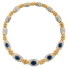 Here we have a breathtaking and very well made necklace that is crafted from solid 18k yellow and white gold. The necklace features fine oval cabochon cut sapphires, of which two have been randomly selected for testing by GIA, and are neatly bezel set throughout the center of the chain with largest at its center. These gorgeous and large stones total approximately 34 carats in weight and are well matched showing an amazing royal blue color that brings such a rich look to this bold necklace. The sapphires are each surrounded by very fine diamonds that are perfectly pave, adding approximately 4 carats to the total weight, and display truly outstanding brilliance with rich amount of sparkle for a super glamorous look.The remaining fancy links are constructed from matte finish white gold and h Bold Necklace, Royal Blue Color, Oval Cabochon, Link Necklace, Gold Material, Bezel Setting, Pave Diamonds, Patina, Sapphire