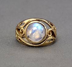 "Handmade item Product :- ring Material :- brass, sterling silver  💎 The gemstone is the MOONSTONE. ✦ Moonstone is a stone that brings hope, enhances feminine energies, sensitivity, intuition, and psychic abilities. It is also said to bring strong energies of abundance to one's life.Moonstone is a stone of protection, especially during childbirth, pregnancy, and travel at sea. It is a stone of calm and relief from emotional stress. Moonstone is birthstone of June. 💎 The natural gemstone can va Unique Yellow Gold Moonstone Ring, Handmade Gold Celestial Moonstone Ring, Handmade Yellow Gold Moonstone Ring Spiritual Style, Mystical Gold Moonstone Ring, Gold Mystical Moonstone Ring, Gold Moonstone Birthstone Ring, Bohemian Gold Oval Moonstone Ring, Gold Moonstone Ring With Moon Phase, Gold Moonstone Ring With Stone Setting