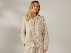 Sleep in pure organic cotton with the Women’s Isla Organic Cotton Long-Sleeve Pajama Set. Gentle on your skin, breathable, and naturally hypoallergenic, this set is made from garment-washed poplin with a percale weave that becomes softer over time. The top features two breast pockets, while the bottom includes two front pockets and a comfortable elastic waistband for a perfect fit. | Coyuchi Women's Isla Organic Cotton Long Sleeve Pajama Set Small Sage with Gulf