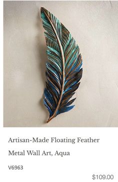 Artisan-Made Floating Feather Metal Wall Art, Aqua. Create a dynamic display with these artist-crafted copper feathers. Each piece is individually made with hand-applied cold oxidation ranging in a variety of hues. A hidden mount on the back allows for a variety of display options and looks as if they are floating on the wall. Artist included hangtag with a copy of Emily Dickinson's poem "Hope" is included with each feather. Create a dynamic display with these artist-crafted copper feathers Each Floating Feather, Dickinson Poems, Metal Feather, Hope Is, Mosaic Art, Metal Walls, The Wall, Metal Wall Art, Feathers