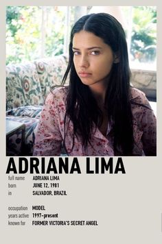 the poster for adrianna llma is displayed in front of a couch and window