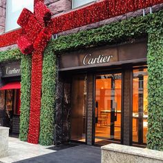 a red bow on the side of a building