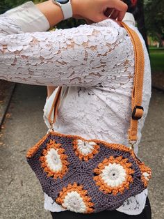 Elevate your accessory game with this versatile, handmade crochet purse that easily transforms from a shoulder bag to a sling bag. Skillfully crafted with high-quality yarn, this stylish bag combines functionality with a touch of boho charm, making it the perfect companion for everyday use, festivals, or a casual day out. Everyday Crochet Crossbody Bag, Hand Knitted Everyday Pouch Bag, Hand Knitted Pouch Bag For Everyday Use, Crochet Satchel Shoulder Bag, Hand Knitted Pouch Shoulder Bag, Handmade Crochet Crossbody Bag For Everyday, Everyday Handmade Crossbody Crochet Bag, Hand Knitted Pouch Shoulder Bag For Daily Use, Everyday Crochet Shoulder Bag