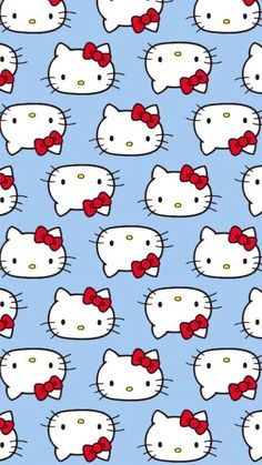 hello kitty wallpaper with red bow ties on it's head and blue background