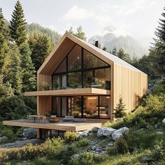 a house in the middle of some trees and rocks with mountains in the back ground