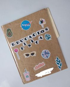 a brown book with stickers on it