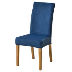 a blue velvet dining chair with wooden legs