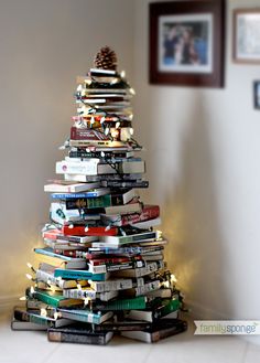 a small christmas tree made out of books