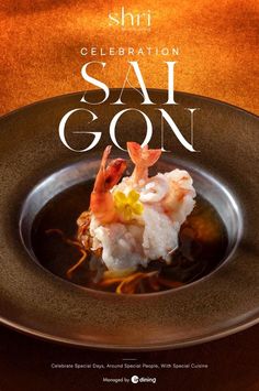 a plate with food on it and the words celebration sai gon written in white