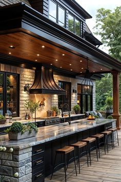 an outdoor kitchen with lots of counter space