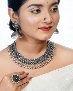 The Product includes Choker, nosepin, Jhumkas and Ring Premium quality Alloy Choker Jewelry For Wedding, Alloy Choker For Wedding, Alloy Wedding Choker Jewelry, Festive Silver Alloy Jewelry, Oxidized Kundan Necklace For Wedding, Oxidized Finish Jewelry For Weddings, Temple Jewelry Oxidized Choker, Oxidized Metal Jewelry Sets, Festive Oxidized Round Jewelry