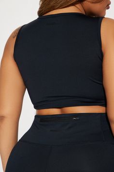 Available In Black. Active Top Scoop Neck Sleeveless Padded Cropped Active Biker Short High Waisted, Elastic Waistband Elevate Reflective Detail High Performance Stretch Body: 73% Polyester 27% Spandex Inner Mesh: 82% Nylon 18% Spandex Imported | Sprint Reflective Elevate Active Set in Black size XS by Fashion Nova Sleeveless Black Seamless Activewear, Sleeveless Tops With Built-in Bra, Fitted Sleeveless Elastane Sports Bra, Black Seamless Tank Activewear, Black Tank Crop Top With Built-in Bra, Black Stretch Vest With Built-in Bra, Sleeveless High Stretch Crop Top With Built-in Bra, Black Tank Top For Yoga With Bust Support, Black Tank Top With Bust Support For Yoga