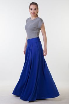 Long blue skirt with pockets from comfy jersey fabric. Skirt length 105 centimeters. Model wears size US 6, she is 160 cm tall with 10 cm heels. Her skirt is 105 cm long Please, use this size chart to select your size US 0 Bust 82 cm (32.5 inches) Waist 64 cm (25 inches) Hips 89 cm (35 inches) US 2 Bust 85 cm (33.5 inches) Waist 66 cm (26 inches) Hips 92 cm (36 inches) US 4 Bust 88 cm (34.5 inches) Waist 68 cm (27 inches) Hips 94 cm (37 inches) US 6 Bust 90 cm (35.5 inches) Waist 71 cm (28 inche Fitted Full Length Maxi Skirt With Pockets, Flowy Wide Hem Maxi Skirt, Gathered Wide Hem Bottoms, Full-length Relaxed Skirt With Pockets, Solid Wide Hem Lined Skirt, Relaxed Full-length Skirt With Pockets, Solid Color Skirt With Wide Hem And Lining, Relaxed Gathered Skirt With Wide Hem, Relaxed Maxi Skirt With Pockets