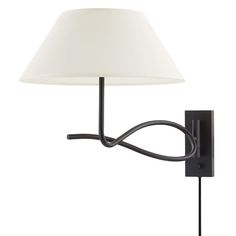 a wall lamp with a white shade on the top and black metal arm, against a white background