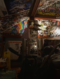 a room filled with lots of posters and pictures