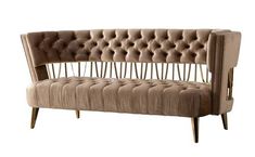 an upholstered couch with wooden legs and tufted backrests, on a white background