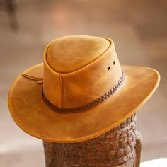 Golden Tan Men's Leather Hat - Cattleman Ranger | NOVICA Rugged Leather Hat With Flat Brim, Classic Brown Hat With Waxed Finish, Brown Hat With Waxed Finish And Curved Brim, Brown Waxed Brimmed Hats, Brown Waxed Finish Hat With Flat Brim, Brown Waxed Finish Hat With Curved Brim, Brown Flat Brim Hat With Waxed Finish, Brown Waxed Finish Hats, Brown Waxed Finish Curved Brim Hat