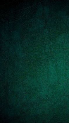 a dark green leather texture background or wallpaper with space for your own text, photo or image