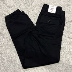 Nwt H&M Black Cargo Pants Mens Xs 2 Pockets In The Front 2 Button Pockets In The Back Utility Pants With Welt Pockets For Streetwear, Black Cargo Pants With Welt Pockets For Streetwear, Casual Black Cargo Pants With Patch Pockets, Black Utility Pants With Welt Pockets, Urban Black Pants With Patch Pockets, Black Utility Bottoms With Welt Pockets, Urban Black Bottoms With Patch Pockets, H&m Casual Tapered Leg Pants, Black Casual Cargo Pants With Welt Pockets