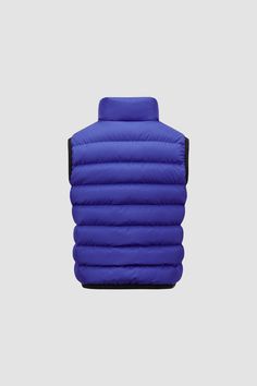 Part of a functional wardrobe of an active kid, the Contrin down vest is designed to allow both freedom of movement during play and protection. The puffer vest is finished with an elastic logo trim. Functional Wardrobe, Down Jackets, Down Vest, Puffer Vest, Down Jacket, Electric Blue, Vest Jacket, Activities For Kids, Puffer