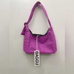 Brand New W/ Tags - Baggu Mini Nylon Shoulder Bag In Extra Pink 21.5” Adjustable Quilted Strap - Measures 6”X9”X2.75” Casual Rectangular Nylon Hobo Bag, Casual Purple Hobo Bag For Travel, Casual Pink Baguette Bag For Travel, Trendy Nylon Canvas Bag For Daily Use, Trendy Purple Baguette Bag For Everyday Use, Casual Pink Baguette Bag For Everyday, Casual Pink Nylon Shoulder Bag, Rectangular Nylon Baguette Bag For Everyday Use, Casual Purple Hobo Bag For Everyday Use