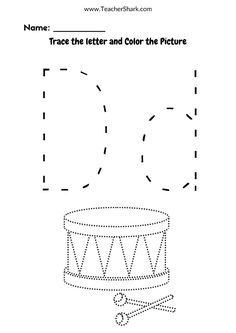 a coloring page for children with a drum and bone on the ground, which is also in