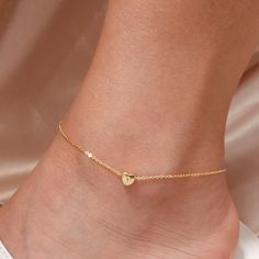 "❤️ Grab 3 fabulous items and enjoy a delightful 25% off when you use the code BUY3GET25 Embrace simplicity and love with our Tiny Heart Initial Anklet. This delicate and dainty ankle bracelet, personalized with a tiny heart pendant, is the perfect bridesmaid gift or simple gold bracelet. #YOU MAY LIKE THIS Personalized coin disc anklet https://www.etsy.com/listing/1514227907/personalized-coin-disc-anklet-summer Personalized Heart charm Anklet https://www.etsy.com/listing/1500037082/personalized Gold Anklet With Initial, Trendy Anklets For Valentine's Day, Trendy Gold Heart-shaped Anklets, Elegant Heart-shaped Anklets For Valentine's Day, Trendy Heart-shaped Anklets For Valentine's Day, Elegant Heart Charm Anklets For Valentine's Day, Elegant Gold Anklets With Heart Charm, Elegant Heart-shaped Anklets For Wedding, Delicate Wedding Anklets