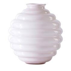 a white vase is shown against a white background