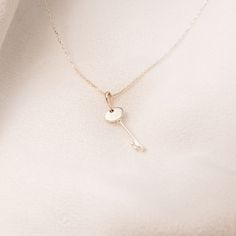 This key necklace is a beautiful, trendy statement piece that can be engraved. It is the perfect necklace to be worn on its own or layered with some of your favorite pieces. NECKLACE DETAILS: Pendant Dimensions: 28.25 x 8.6 mm Chain Length: 16-18 Inches Clasp Type: Lobster Clasp Chain Style: Cable Finish State: Polished Available in: Silver, 14K rose gold, 14K white gold, or 14K yellow gold ****These necklaces have a 4-week lead time. If you need your necklace sooner than that, please contact us Elegant Sterling Silver Key Jewelry, Elegant Sterling Silver Key Necklace, Elegant Heart-shaped Necklace With Two Keys, Elegant Heart-shaped Key Jewelry, Elegant Two Keys Necklace As Gift, Elegant Two Keys Necklace Gift, Elegant Two Keys Necklace For Gift, Elegant Key Pendant Necklace, Heart Shaped Two Keys Necklace For Anniversary