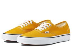 Vans Authentic - Skate Shoes : Color Theory Golden Yellow : Lightweight and flexible canvas upper. With roots firmly entrenched in So.Cal surf and skate culture but embraced around the world; stay true with the clean, classic, and uncompromising aesthetic of the Vans Authentic shoes. Cotton drill lining. Some colors may feature suede or leather. Please see color name for more information. Die-cut EVA insert. Casual sneakers with lightweight and flexible canvas, suede, or leather uppers. Traditio Vans Orange, Vans Authentic Shoes, Vans Yellow, Yellow Vans, Surf And Skate, So Cal, Vans Authentic, Shoes Color, Womens Vans