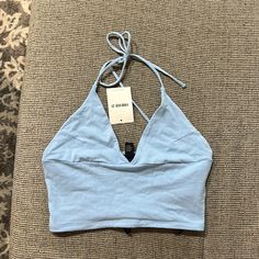 Forever 21 Baby Blue Halter Crop. Size Small New With Tags Attached Trendy Blue Tank Top For Spring, Trendy Fitted Light Wash Tank Top, Trendy Blue Tank Top, Light Blue Stretch Crop Top For Summer, Light Blue Fitted Cotton Tank Top, Fitted Light Blue Cotton Tank Top, Blue Halter Crop Top For Vacation, Blue Fitted Trendy Crop Top, Fitted Light Blue Crop Top For Beach