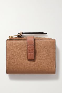 Find LOEWE Two-tone Textured-leather Wallet on Editorialist. Loewe's wallet comes in muted shades of 'Light Caramel' and 'Pecan'. Crafted from textured and smooth leather, the bifold silhouette unzips to reveal multiple slots for your credit cards and slip pockets for notes and receipts, all secured by a single logo-embossed strap. Slip it into one of the label's 'Puzzle' bags. Luxury Soft Leather Brown Wallets, Luxury Brown Soft Leather Wallet, Cognac Leather Wallet, Zip Wallet, Card Holder Wallet, Mr Porter, Credit Cards, Belt Bag, Smooth Leather