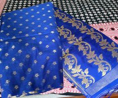 Blue handloom silk with zari border Elegant Blue Slub Silk Dupatta, Blue Festive Slub Silk Traditional Wear, Festive Blue Slub Silk Dupatta, Elegant Blue Slub Silk Saree, Blue Traditional Wear In Slub Silk With Self Design, Blue Slub Silk Traditional Wear For Festivals, Festive Blue Raw Silk Dupatta, Formal Blue Dupatta With Zari Work, Blue Cotton Silk Dupatta With Cutdana