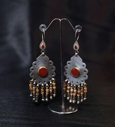 Vintage Turkmen silver earring hand made with natural stone coral and carnelian stones Handmade Amber Agate Earrings, Red Agate Earrings With Natural Stones, Carnelian Natural Stones Dangle Earrings, Carnelian Dangle Earrings With Natural Stones, Carnelian Gemstone Dangle Earrings, Red Agate Earrings As Gift, Red Agate Earrings For Gift, Amber Carnelian Gemstone Earrings, Traditional Silver Carnelian Jewelry