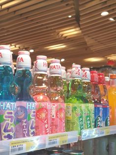 bottles of water are on display in a store