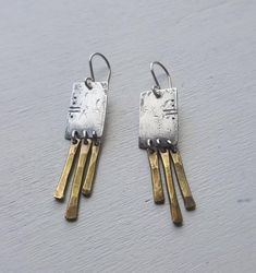 Relic Fringe Earrings Mixed metal silver and gold | Etsy Artisan Silver Brass Earrings, Hand Forged Silver Brass Earrings, Hammered Silver Brass Earrings, Silver Hammered Brass Earrings, Artisan Sterling Silver Bronze Earrings, Modern Brass Earrings With Oxidized Finish, Artisan Bronze Sterling Silver Earrings, Bronze Artisan Sterling Silver Earrings, Artistic Hammered Metal Earrings