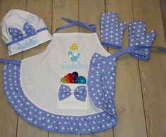 a blue and white bib with matching accessories