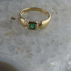 14K Yellow Gold Emerald Ring, 4x3,5mm emerald cut, included fine green emerald center, bezel set, .25 inch wide, Ring size 6.5, Circa 1980, 3.3 grams SKU # BB257R12 This listing contains photographs of the actual item you will receive. Our items are in excellent condition with little or no signs of wear and many are one of a kind pre-owned estate finds. Please look closely at the pictures in this listing as they are part of the product description. Please read the description, as any imperfectio 14k Gold Emerald Ring With Bezel Setting, Gold Emerald Ring With Smooth Bezel As Gift, Gold Emerald Ring With Smooth Bezel For Gift, Yellow Gold Emerald Ring With Smooth Bezel, 14k Gold Bezel-set Emerald Ring, Gold Emerald Ring, Emerald Ring Gold, Ring Bezel, Wide Ring