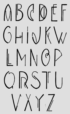 the alphabet is drawn in black ink on a gray background, and it appears to be made