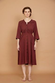 An easy, everyday midi dress with a matching fabric belt. Made from a cotton flax fabric with a lovely natural texture.Features dark wooden buttons up the front and subtle detailing around the collar.Detachable fabric belt can be tied at the front or back. Dress Length: Petite 43” / Regular 47” / Tall 50" Collared Linen Midi Dress For Work, Cotton Dress With Belted Cuffs For Fall, Belted Midi Linen Dress For Work, Belted Linen Midi Dress For Daywear, Brown Cotton Midi Dress For Work, Brown Cotton Midi Dress For Daywear, Daywear Midi Linen Dress With Tie Waist, Cotton Midi Dress With Buttons For Work, Brown Button-up Midi Dress For Daywear