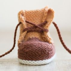 a close up of a pair of knitted shoes