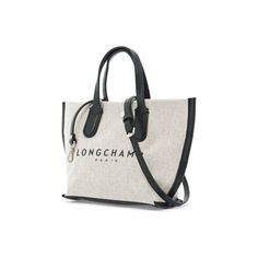 The XS Essential handbag by Longchamp is made of cotton canvas with a rubberized logo lettering and leather base and handles. It features a snap button closure and an unlined interior with a zip pocket. The adjustable and removable leather shoulder strap and silver metal hardware add a touch of elegance to this bag. Makeup Travel Case, Plastic Pollution, Travel Makeup, Travel Case, Beauty Accessories, Metal Hardware, Letter Logo, Leather Handbag, Handbags On Sale