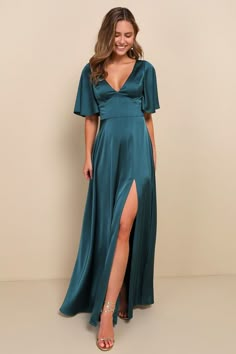 Elegant Confidence Teal Satin Flutter Sleeve Cutout Maxi Dress Dark Teal Bridesmaid Dresses, Teal Satin Dress, Dark Teal Dress, Romantic Essence, Teal Bridesmaid, Teal Bridesmaid Dresses, Bridesmaid Dresses With Sleeves, Cutout Maxi Dress, Guest Attire