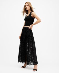 Broderie is our thing. The Rosie Skirt doesn't spare on going all out. The midi-length silhouette features a a full straight hem with slight frill. We've also added an easy side split to create a shape that just flows. This midi skirt looks great paired with tees or bodysuits - try one of our iconic bikers, it's always a finishing touch.  This skirt is designed to a regular fit Pullover Broderie detailing Petite frill Straight hem Side split Full hem Lined Lightweight Midi Skirt Black, Flower Girl Tutu, Black Midi Skirt, Sweaters And Jeans, Side Split, Workwear Dress, Skirt Black, Denim Shop, Sweater Shop