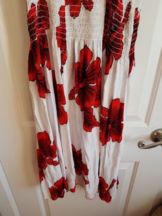 Vintage Ladies Black, Red and Whihte Flower Hawaiian Sun Dress.. very Tropical looking. 100 % rayon. In good vintage condition.. Clean.. no issues. ..I would say it is like a size medium but it has elastic stretch on the bodice area. Red Floral Print Sundress, Red Floral Print Sleeveless Sundress, Flowy Red Floral Sundress, Casual Red Floral Print Maxi Dress, Casual Red Floral Print Sundress, Red Hawaiian Dress For Spring, Red Hibiscus Print Dress For Vacation, Red Cotton Sundress For Vacation, Red Hawaiian Dress With Floral Print